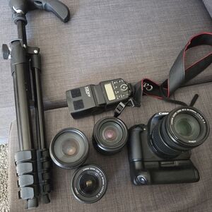 Canon Black DSLR Camera with Lenses and Tripod